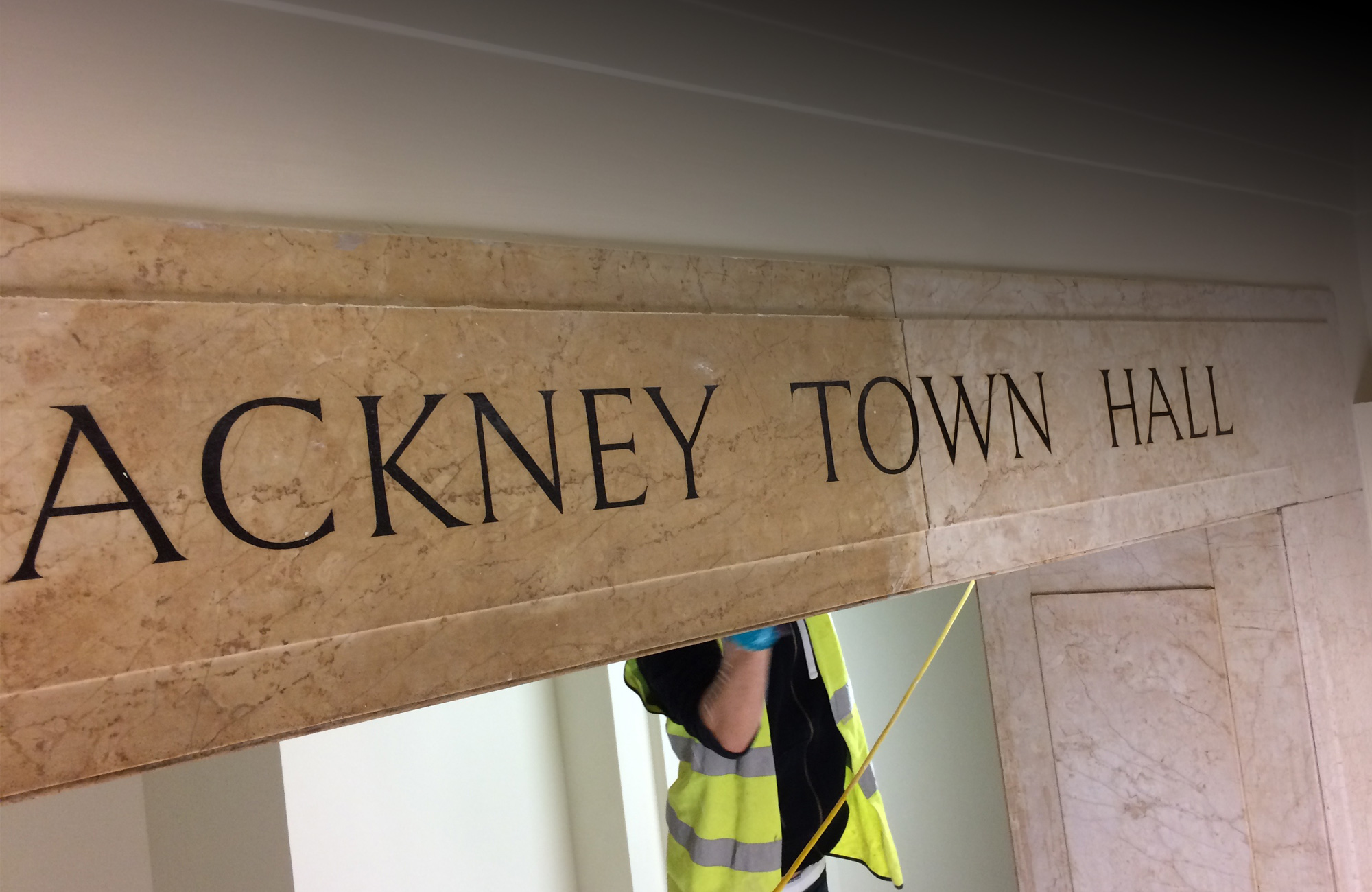 Main entrance sign restoration and clean